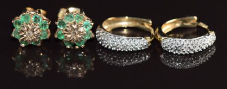 A pair of 9ct gold earrings each set with a diamond surrounded by emeralds and a pair of 9ct gold
