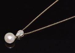 A 9ct gold pendant set with a cultured pearl and diamonds totalling approximately 0.07ct, on 9ct