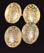 A pair of 15ct gold cufflinks with engraved floral decoration, Birmingham 1882, 6.2g