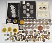 A collection of UK and overseas coinage including halfpenny token, modern crowns, some mixed