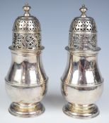 Pair of Queen Anne Britannia standard hallmarked silver sugar casters of baluster form, London 1713,