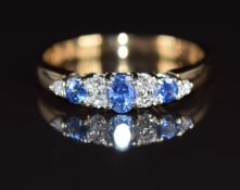 A 9ct gold ring set with sapphires and diamonds, 2.3g, size M