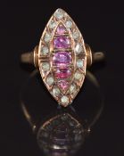 Victorian 9ct rose gold ring set with paste and rose cut diamonds in a marquise setting,