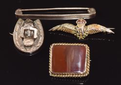 A collection of brooches comprising 9ct gold RAF set with enamel (2.7g, 4cm), 9ct rose gold (2g,