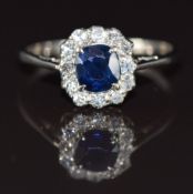 Art Deco 18ct white gold ring set with a cushion cut sapphire of approximately 0.6ct surrounded by