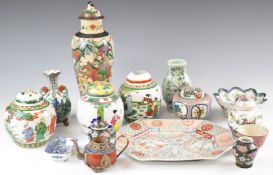 Fifteen mainly Chinese porcelain ginger jars, vases and similar, many with figural decoration,