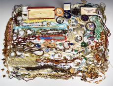 A collection of costume jewellery including freshwater pearl necklace, amber necklace, silver