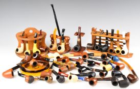 Collection of smoking pipes, stands and accessories to include Peterson of Dublin, silver mounted,