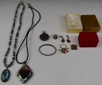 Two silver rings, silver fob watch, labradorite pendant, silver ingot, silver earrings set with