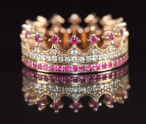 An 18ct gold eternity ring in the form of a crown set with rubies, diamonds and pink sapphires, by