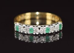 An 18ct gold half eternity ring set with alternating emeralds and diamonds, 2.6g, size I