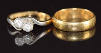 A 22ct gold wedding band / ring (3.2g, size G) and an 18ct gold ring set with spinel, 2g (band cut)