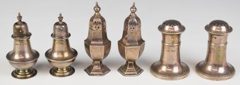 Three pairs of Edward VII and later hallmarked silver peppers including octagonal examples, height