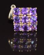 A 9ct gold pendant set with amethysts , 2.1g, 1.1cm