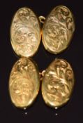 A pair of 9ct gold cufflinks with scrolling decoration, Birmingham 1930, 2.9g
