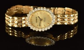 Geneve 14ct gold ladies wristwatch with diamond bezel, two-tone hands, gold baton hour markers and
