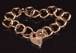 A 9ct rose gold curb link bracelet with heart padlock clasp, 23.5g, 16cm