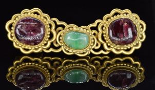 A 19thC Chinese buckle set with jadeite and ruby cabochons, 10 x 3.3cm