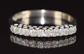An 18ct white gold half eternity ring set with diamonds, 3.3g, size Q