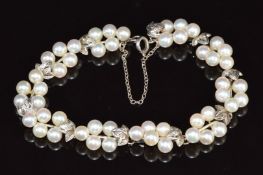 Mikimoto silver bracelet set with cultured pearls in the form of bunches of grapes, 18cm long
