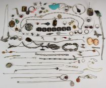A large collection of silver jewellery including two pairs of cufflinks, eleven pendants set with