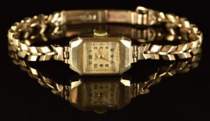 Everite 9ct gold ladies wristwatch with gold hands and Arabic numerals, silver dial and 15 jewel