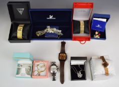 A collection of costume jewellery including Swarovski brooch in the form of Mickey Mouse,