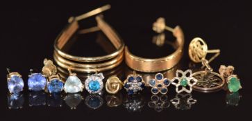 Thirteen single gold earrings including 14k gold earring (2.3g), 9ct gold earring (0.6g), 9ct gold