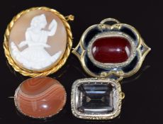 Four Victorian brooches set with cherry amber, quartz, a cameo and agate