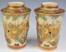 Pair of Japanese Satsuma Meiji period relief moulded vases with figural decoration and seal mark