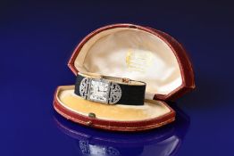 Cartier Art Deco 18ct gold and platinum ladies wristwatch with diamond set case and crown, blued