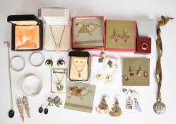A collection of silver jewellery including seven pairs of earrings by Peruvian Collection, rose