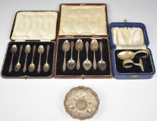Two cased sets of hallmarked silver coffee or teaspoons, one Birmingham 1931, maker William Suckling