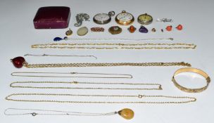 A collection of silver jewellery including pendant set with pressed amber, chain, brooch set with