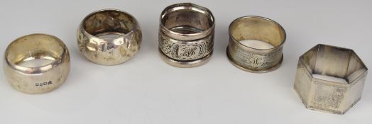 Five silver napkin rings, three hallmarked and two marked sterling, weight 93g