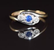 A 9ct gold ring set with a sapphire and diamonds in a platinum twist setting, 1.5g, size J