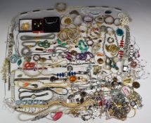 A collection of costume jewellery including silver filigree brooches, silver brooch, JewelCraft