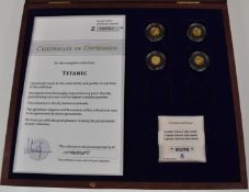 Titanic set of four miniature gold coins comprising four 585 0.5g coins, in fitted case with