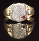 A 9ct gold signet ring set with a garnet, 3.5g, size R