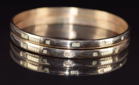 Two 9ct gold bangles with feature hallmarks, 47.3g, 6.8cm