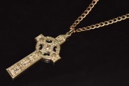 A 9ct gold Celtic cross stamped made in Ireland (4.2cm) and 9ct gold curb link chain (54cm), 12.3g