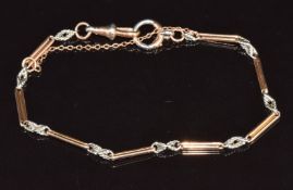 An 18ct rose gold and platinum bracelet made up of elongated and knot links, 14.3g, 20cm long