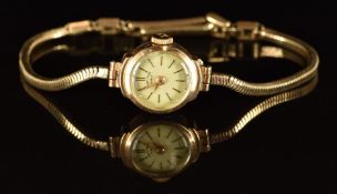 Favre-Leuba 9ct gold ladies wristwatch with gold hands and baton hour markers, silver dial and