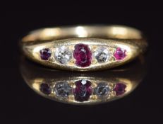 A c1915 18ct gold ring set with rubies and diamonds, 3.3g, size M