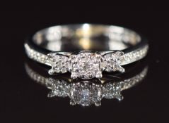 A 9ct white gold ring set with diamonds, 2.8g, size N