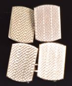 A pair of 9ct gold cufflinks with engine turned decoration, 5.1g