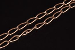 A 9ct rose gold Albert / watch chain made up of twisted oval links, 36g, 42cm