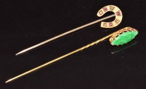 Edwardian 15ct gold stick pin in the form of a horseshoe set with diamonds and rubies (1.1) and a