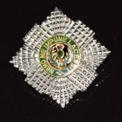 A 9ct white gold brooch set with an enamel plaque 'Nemo me impune lacessit' translating to 'No one