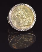 A 9ct gold ring set with a 1907 gold full sovereign, 12.5g, size L